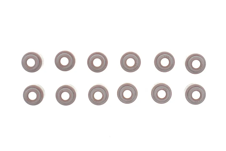 Сальник клапана (впуск) Mazda 626/MX-5 1.8/2.0i 91- (6x11x10.2) (к-кт 12шт) CORTECO 19036427 (фото 1)